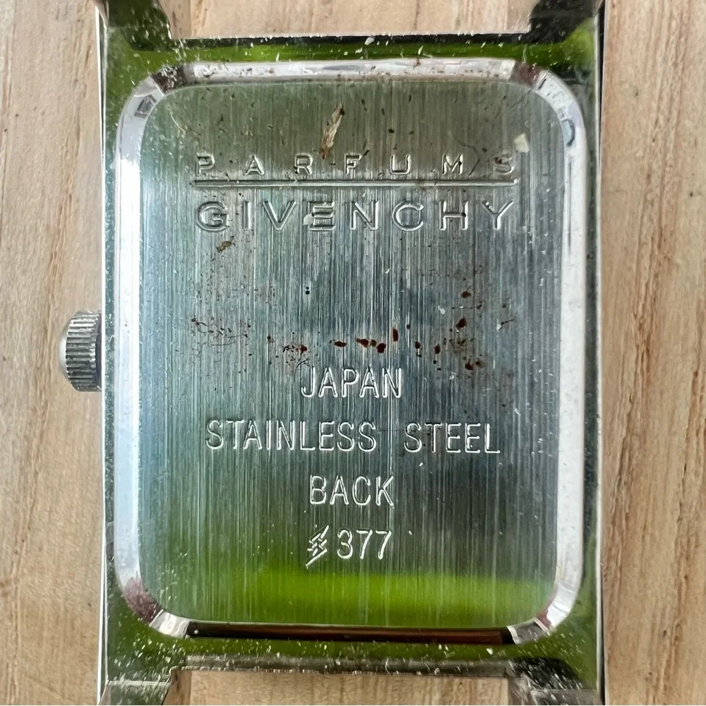 Vintage Givenchy ladies rectangle silver tone leather dress watch NEW BATTERY